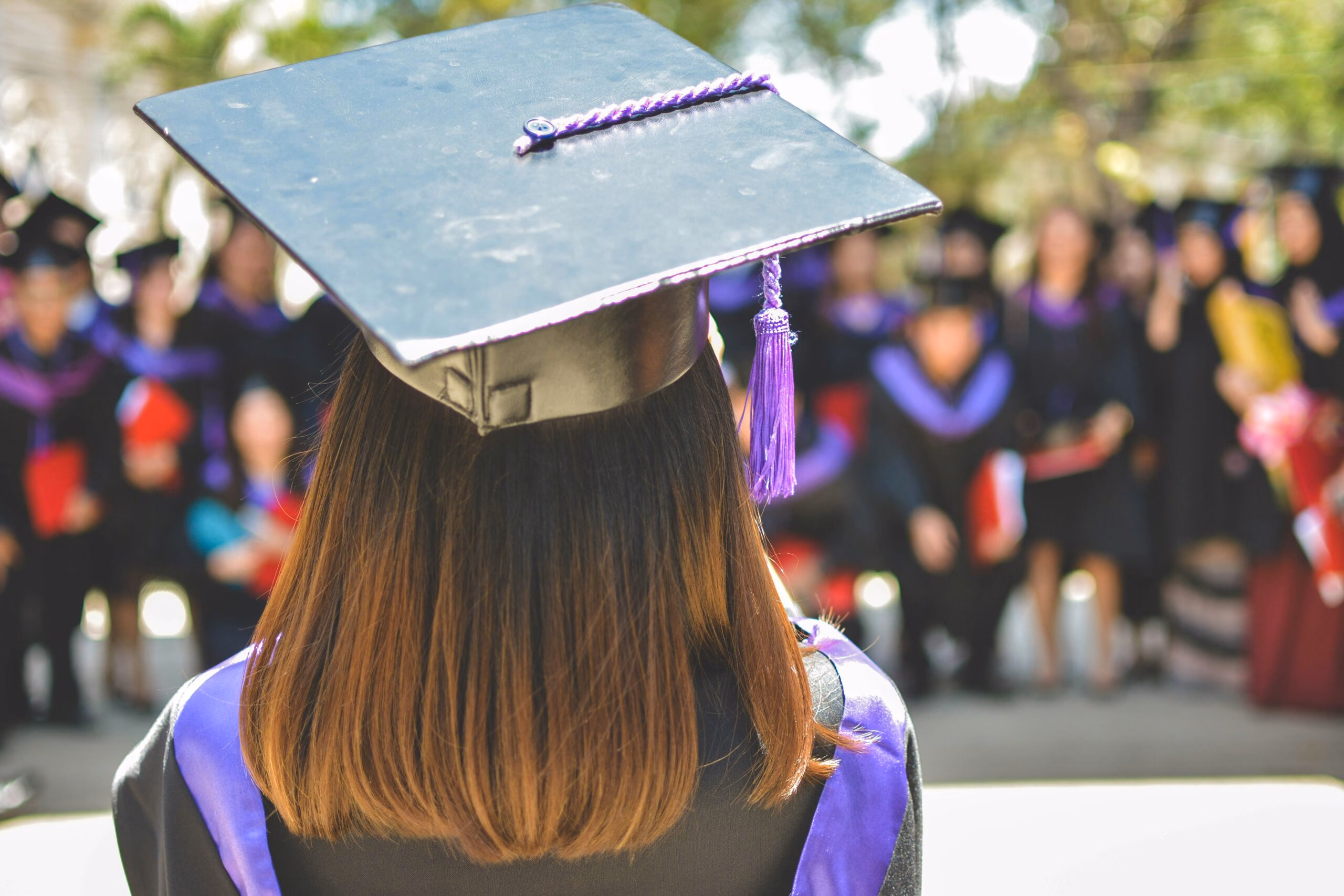 A student graduating from one grade to the next